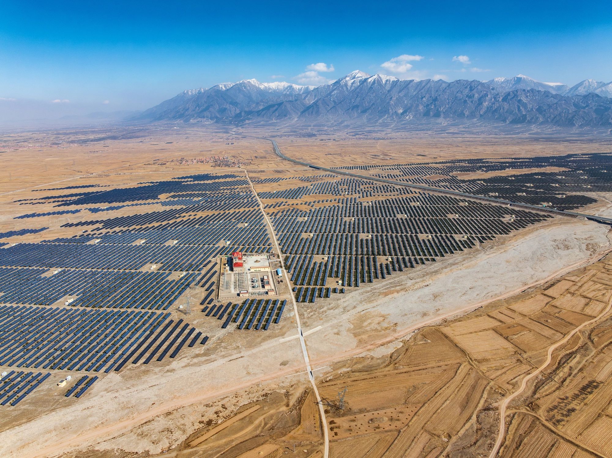 Aerial view of a photovoltaic power plant in a rural area