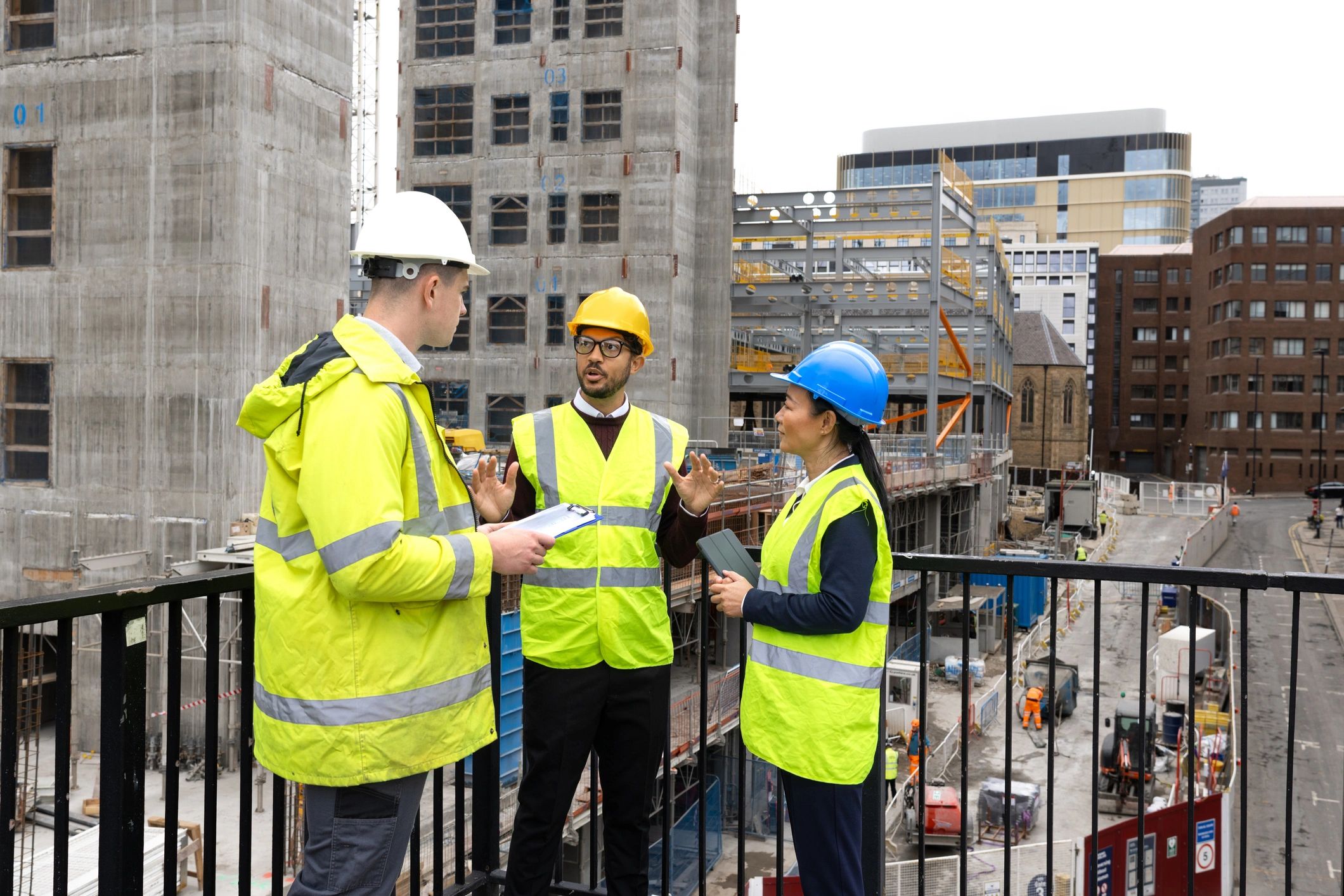 Renewable energy operations team reviewing plans on site
