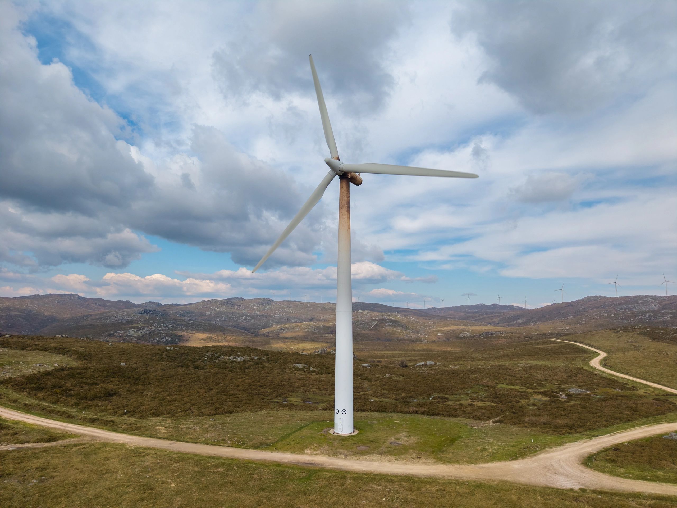Wind turbine in a rural wind farm landscape